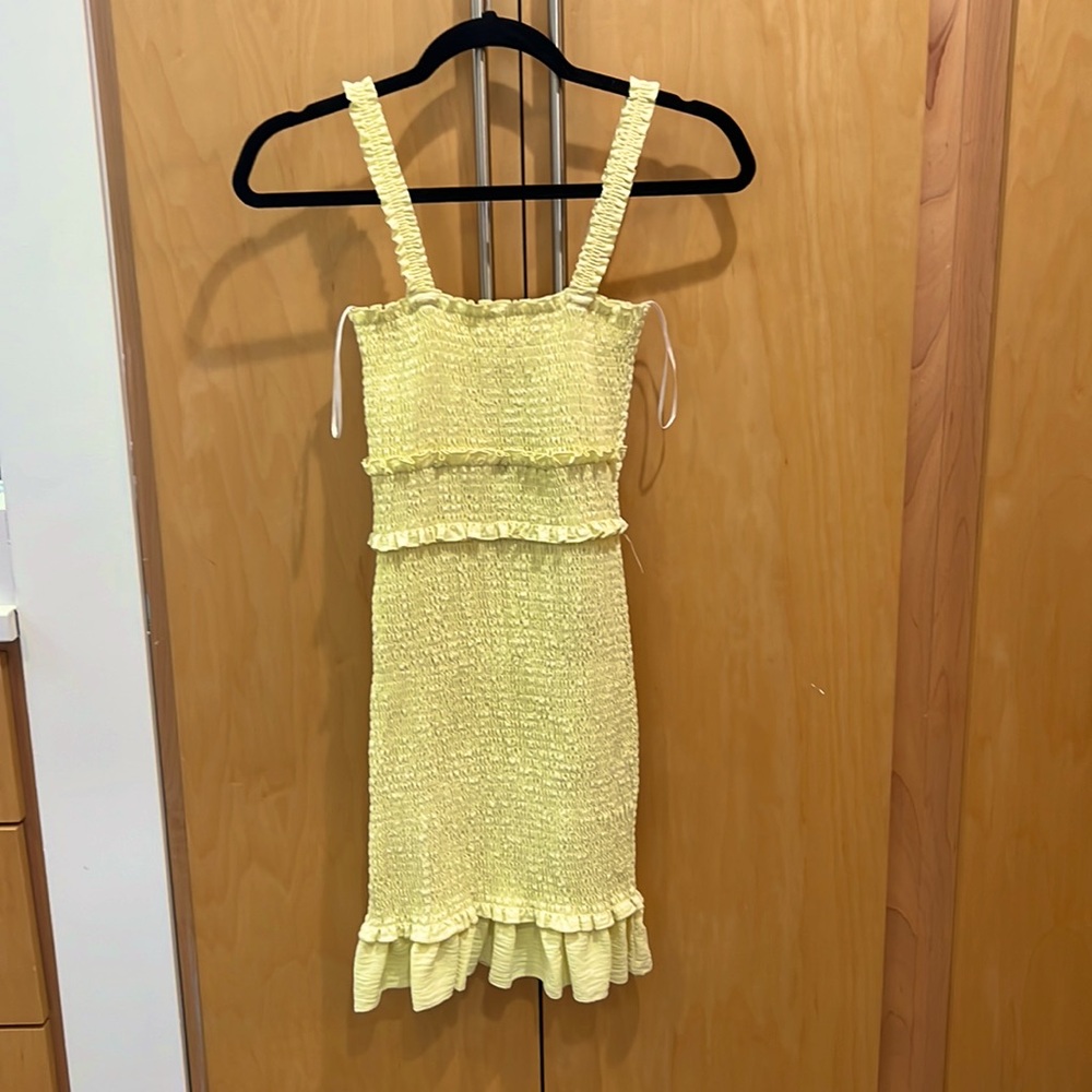 Smocked yellow mini dress